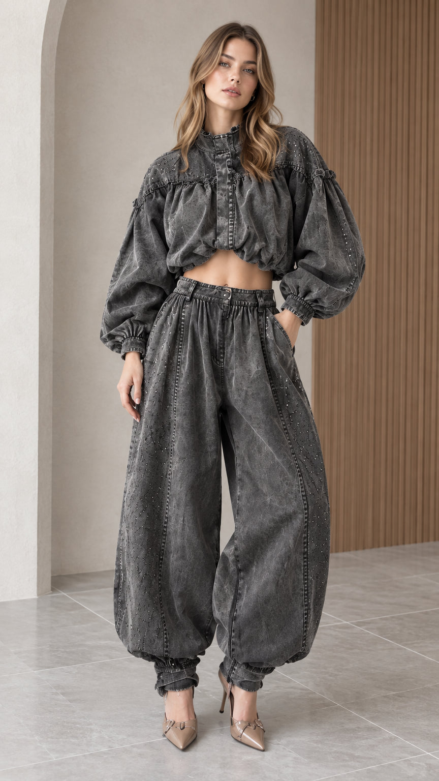 Full front view of model wearing charcoal gray washed denim cropped blouson top and balloon pants set with heels
