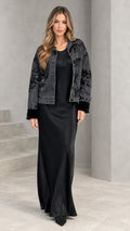 Full front view of black sequin embroidered jacket and satin maxi slip dress set