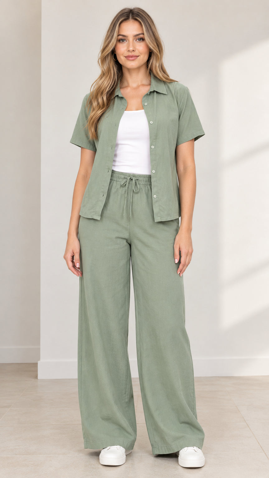 Full front view of model wearing Sage Green short-sleeve shirt and wide-leg drawstring pants two-piece set