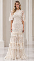 Front view of champagne floral embroidered tiered maxi evening dress with flutter sleeves