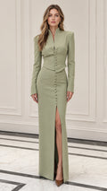 Front full view of woman wearing sage green cropped jacket and slit maxi skirt two-piece set