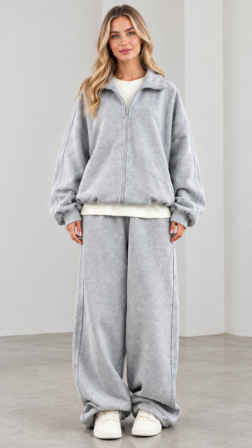 Women's oversized washed grey zip-up jacket and wide-leg sweatpants tracksuit set front view