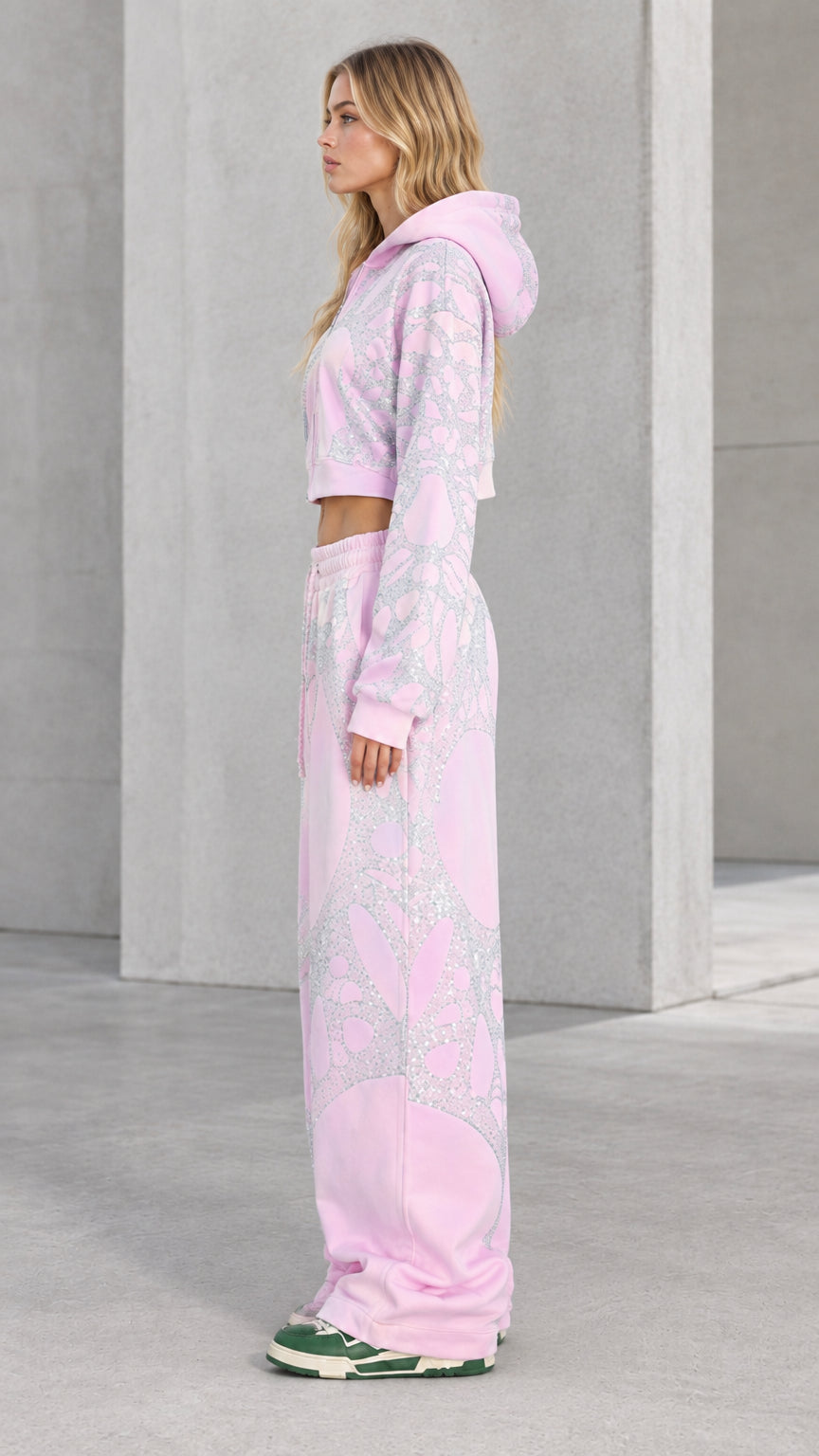Side view of model in Light Pink rhinestone embellished tracksuit set