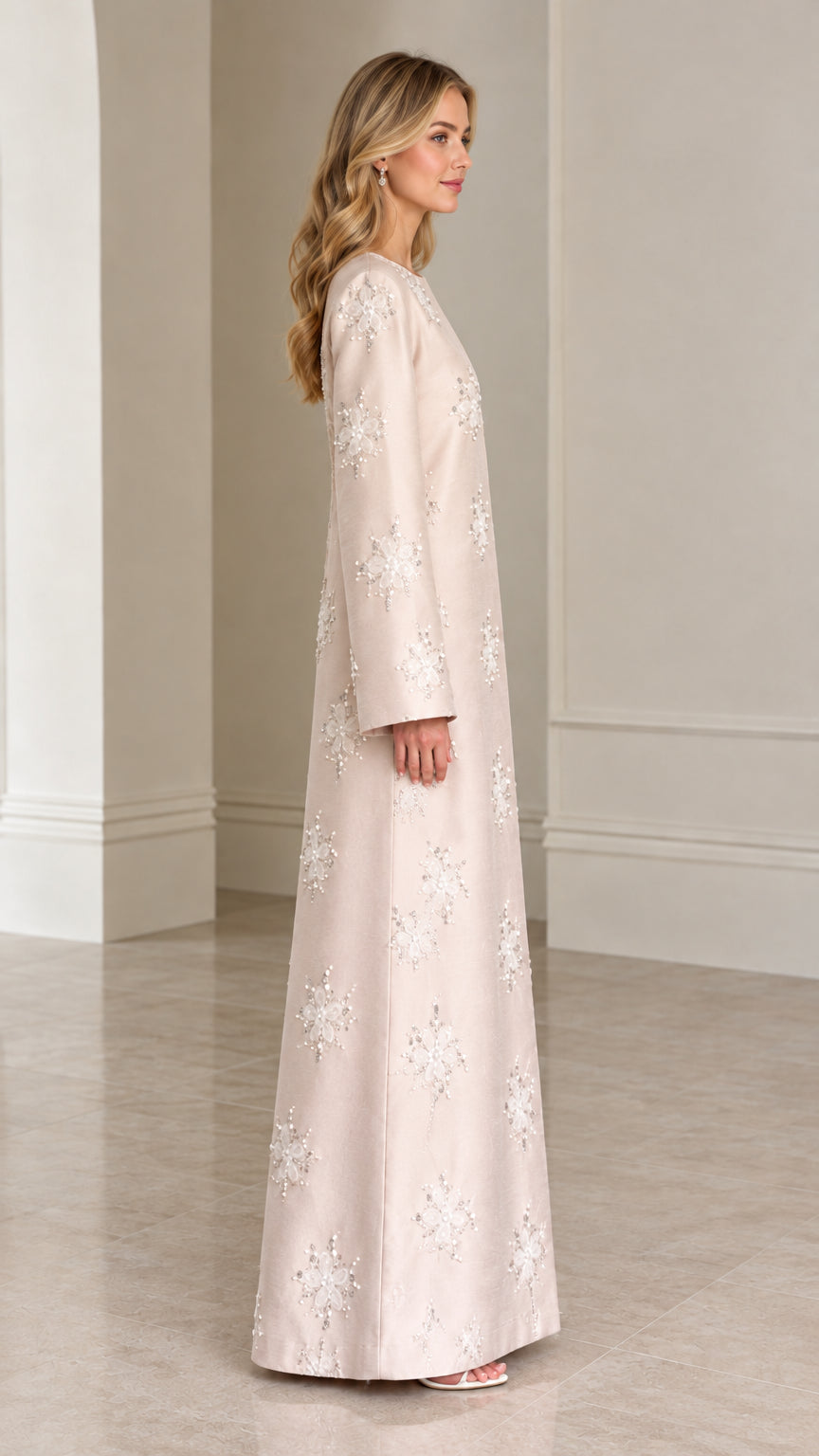 Side profile of elegant Champagne floor-length embellished evening dress
