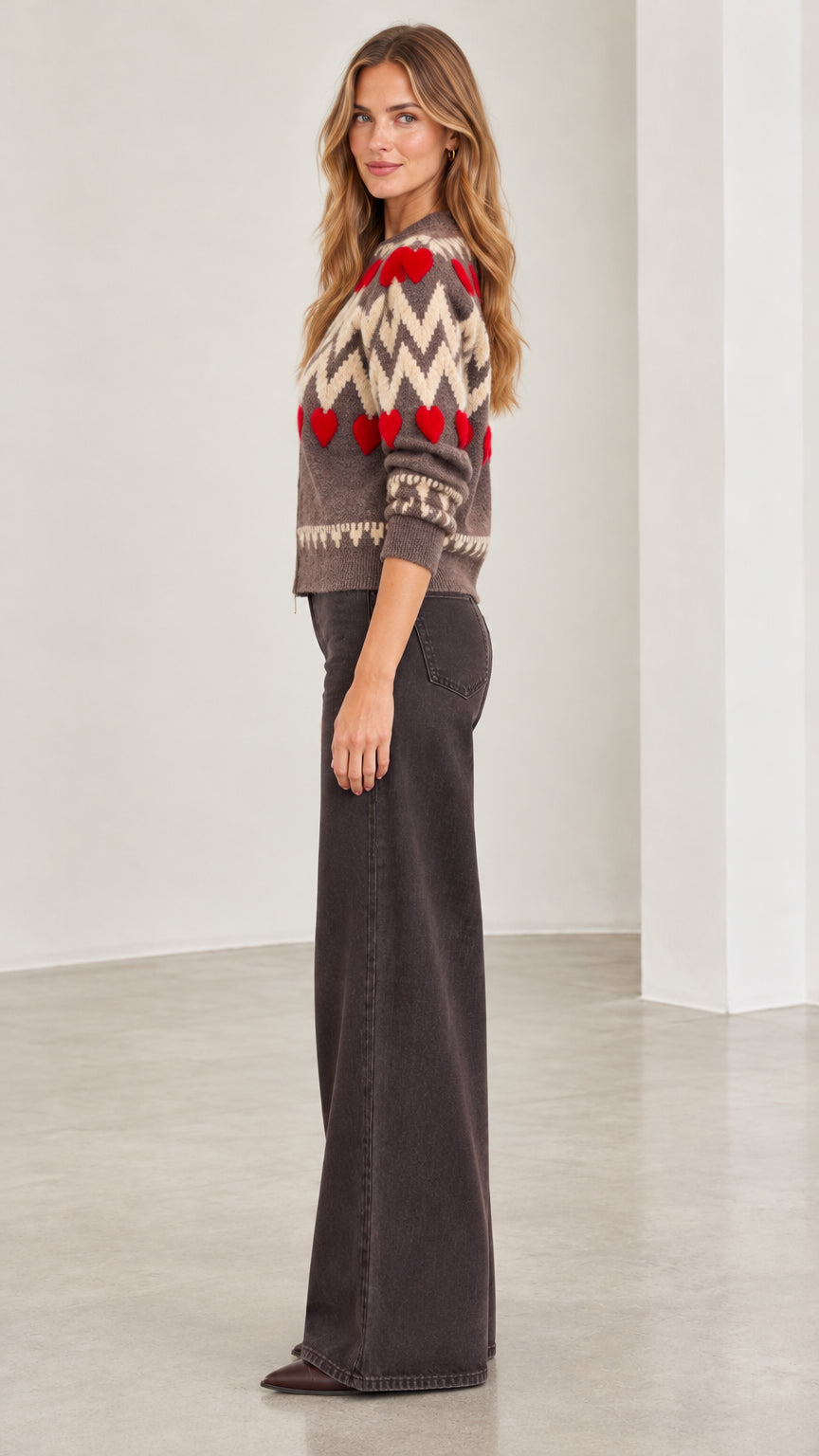 Side view of woman wearing mocha brown chevron heart zip-up knit cardigan