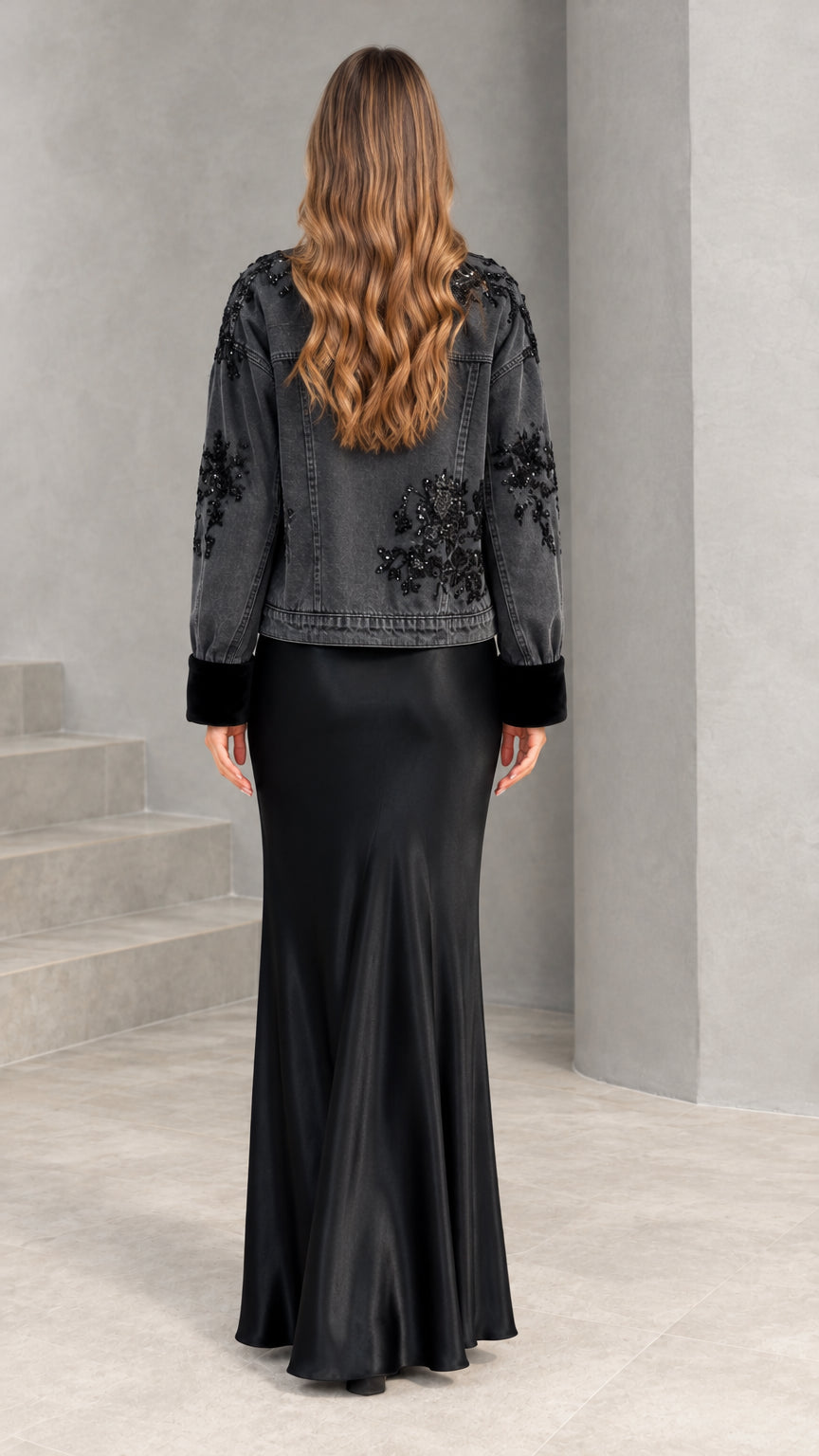 Back view of black sequin embroidered jacket and long satin maxi dress