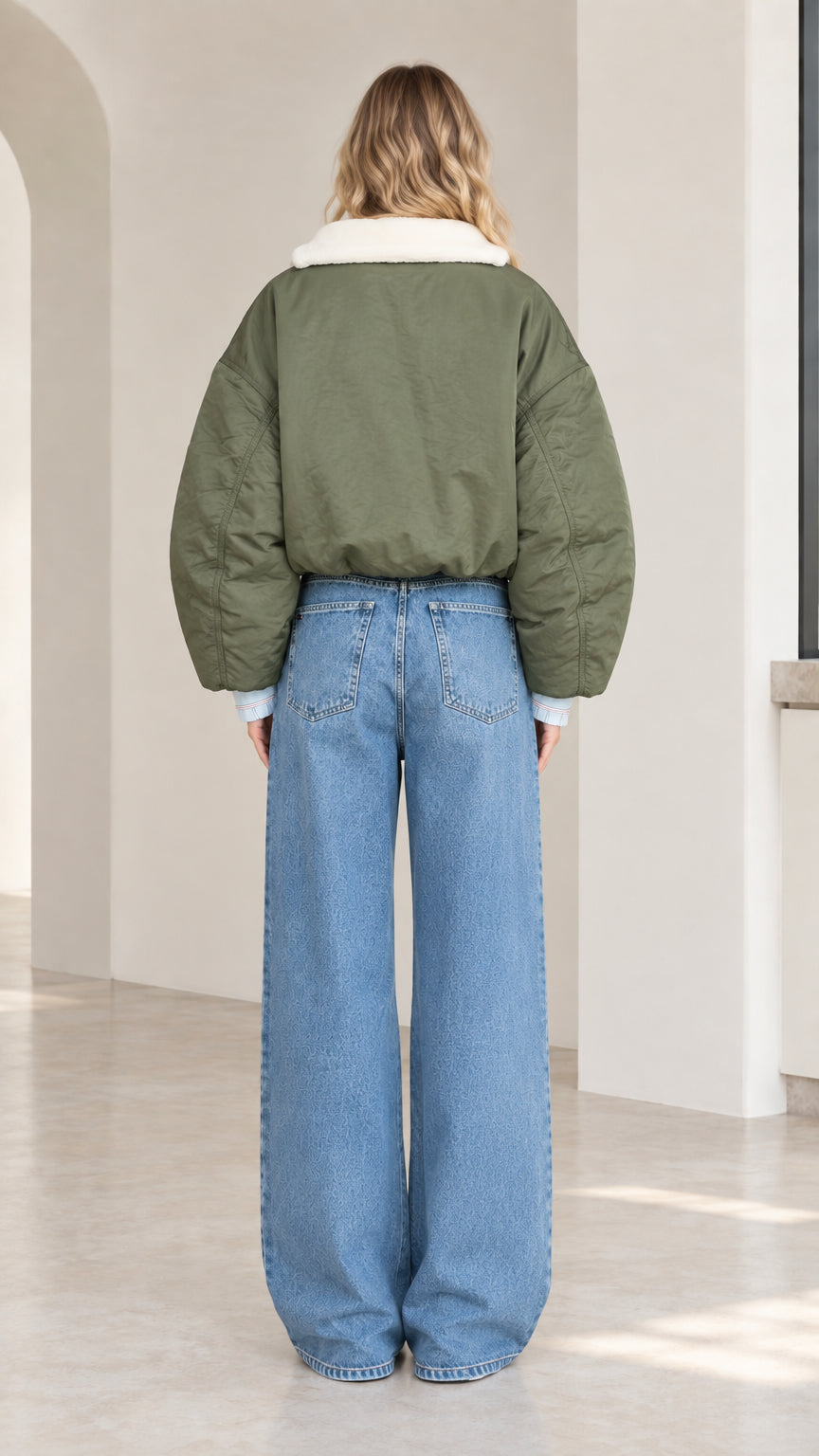 Back full-length view of olive green cropped bomber jacket showing relaxed fit and dropped shoulders