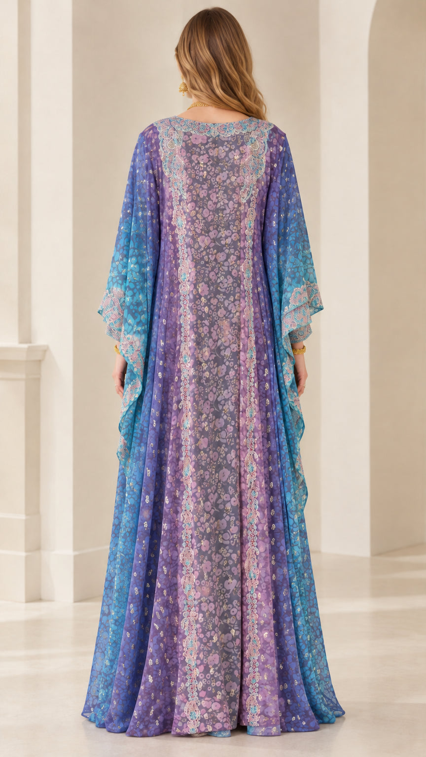 Back view of woman wearing full-length Royal Blue printed draped kaftan