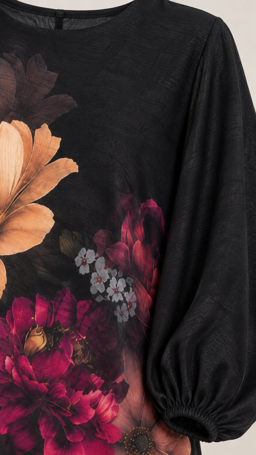 Close up detail of floral pattern and gathered sleeve cuff